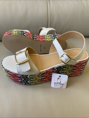 White leather platform sandals by LOTTINI